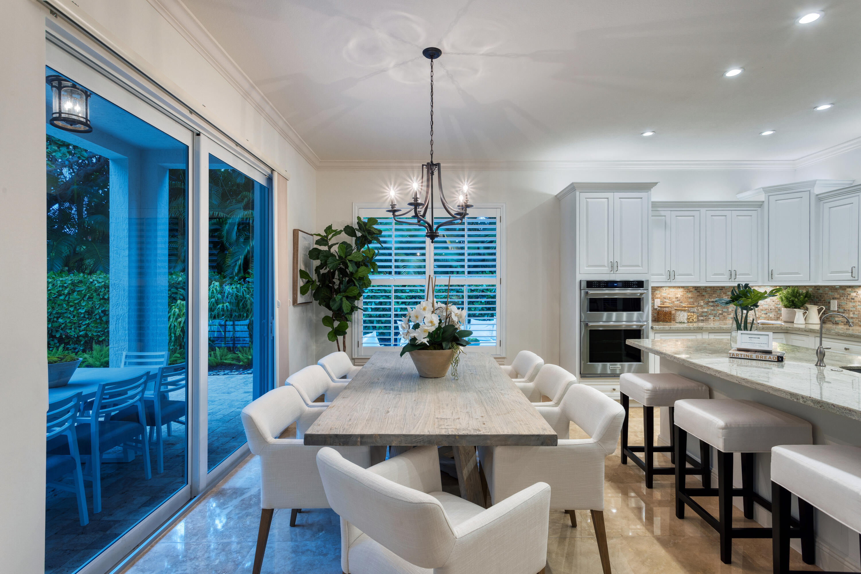 391 East Boca Raton Road Boca Raton, FL 33432 - Photo 8 of 26 a view of a dining room with furniture window and outside view