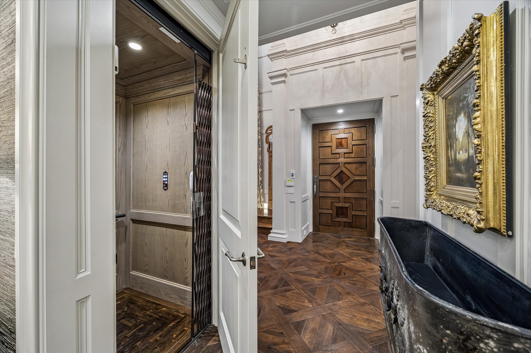 2158 Chilton Road Houston, TX 77019 - Photo 29 of 50 The private elevator, conveniently located off the entry, provides seamless access to all three levels of the home, combining luxury and functionality for effortless daily living.