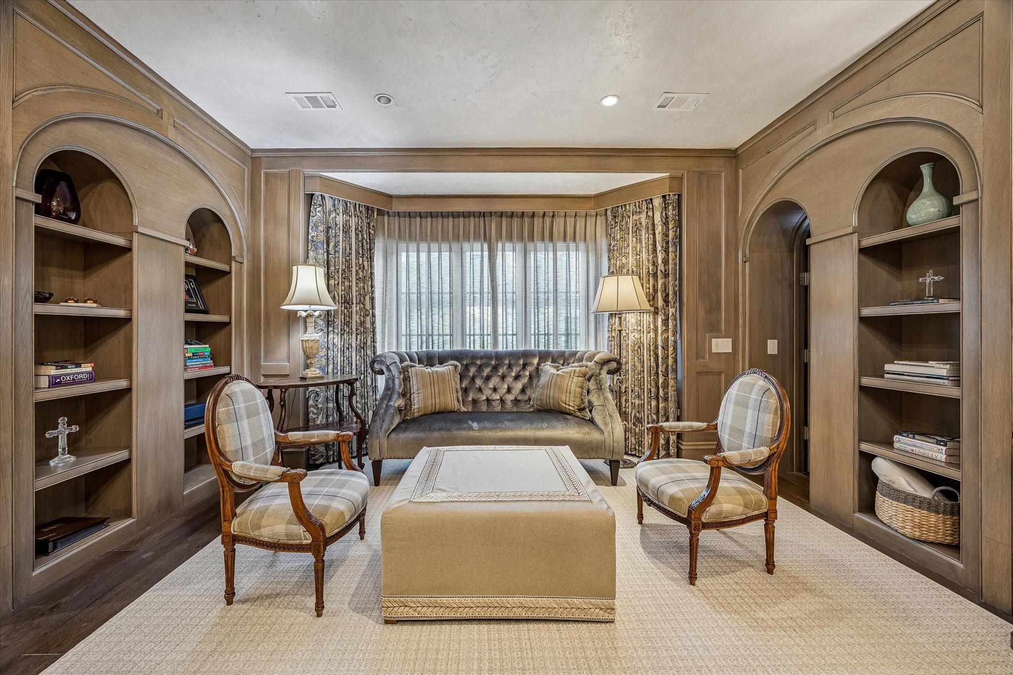 2158 Chilton Road Houston, TX 77019 - Photo 32 of 50 Connected to the library and offering two spacious walk-in closets, the primary suite combines elegance and functionality. Warm hardwood floors and thoughtful lighting details enhance its refined atmosphere.