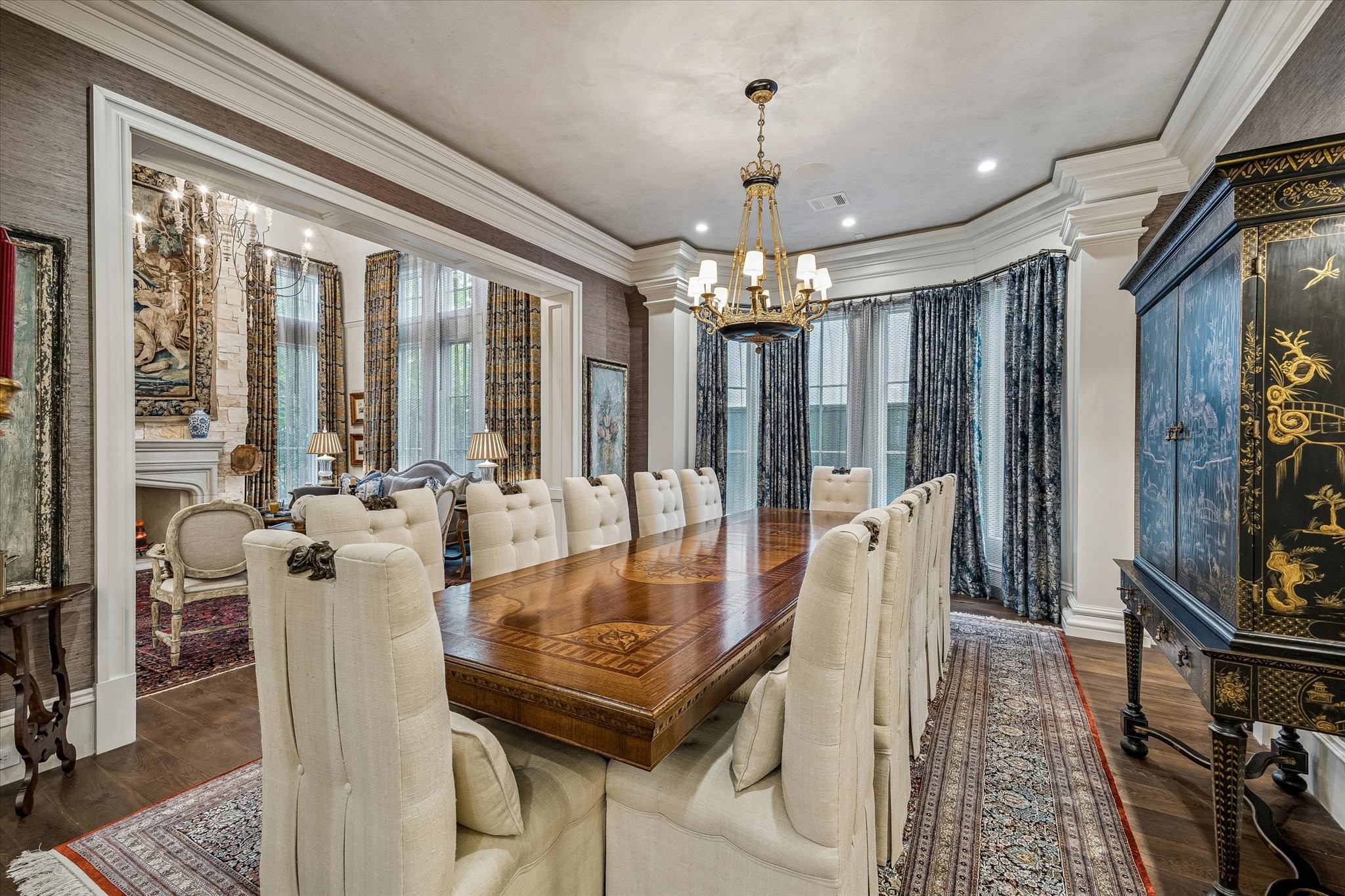 2158 Chilton Road Houston, TX 77019 - Photo 9 of 50 Perfectly designed for entertaining, the dining room blends timeless textures with refined details and custom treatments. The adjoining wine room offers a distinctive touch for curated collections and memorable dinners.