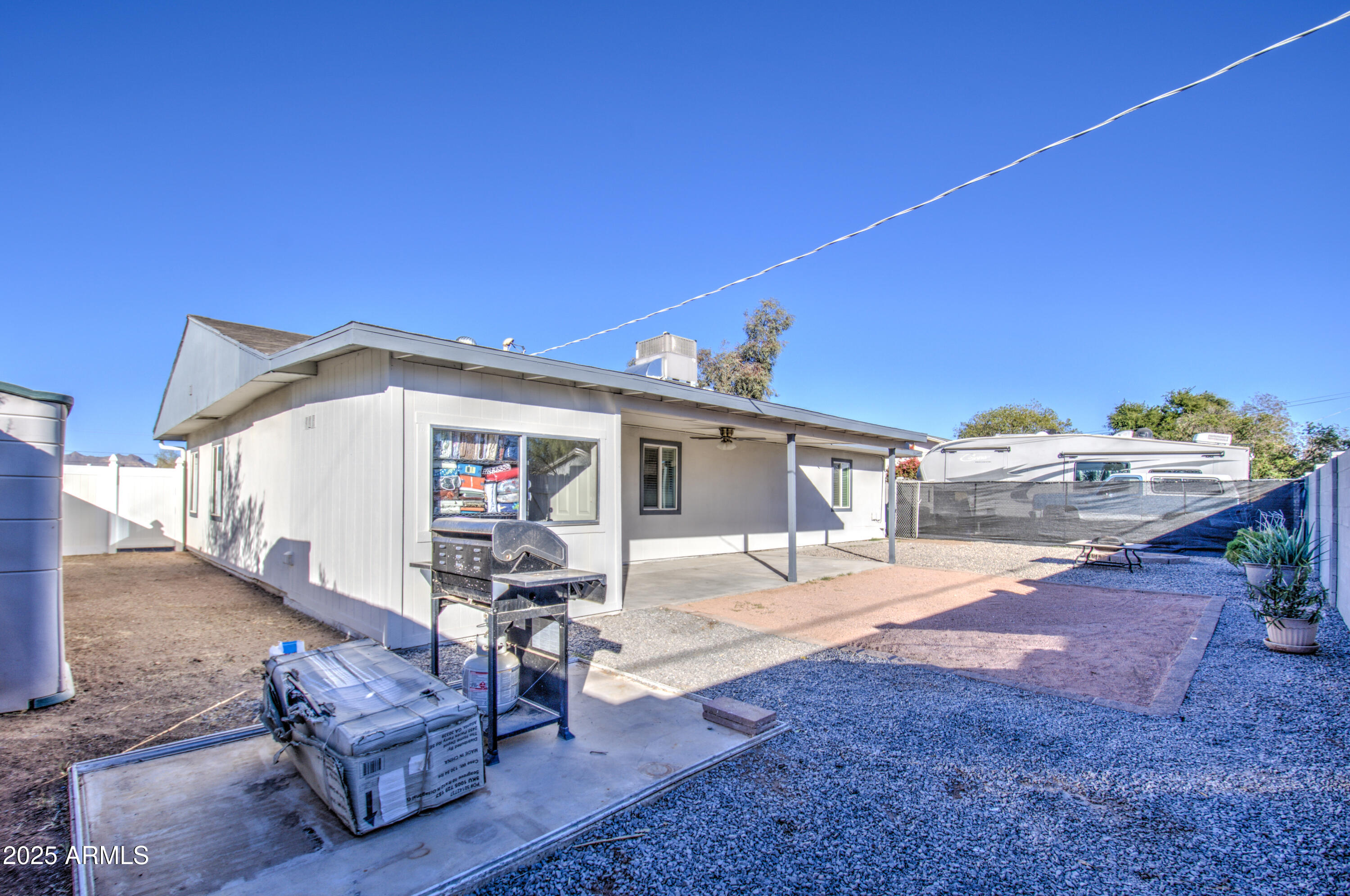 11451 East Broadway Road Mesa, AZ 85208 - Photo 21 of 24 a front view of a house with patio