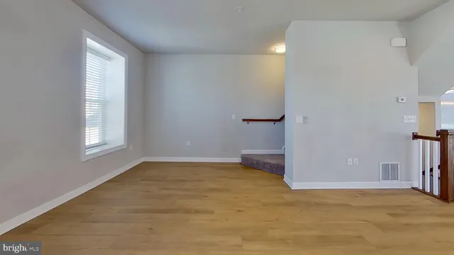 a view of hallway with closet