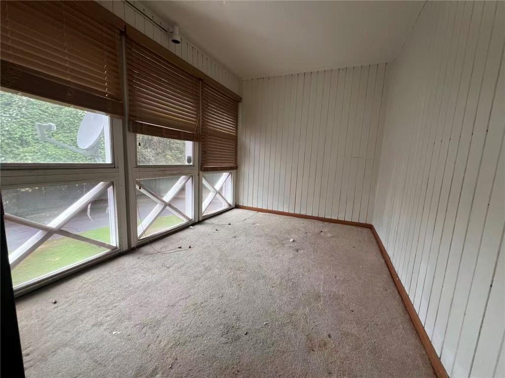 1166 Booth Road Southwest, Unit 908 Marietta, GA 30008 - Photo 22 of 32 a view of an empty room with a balcony