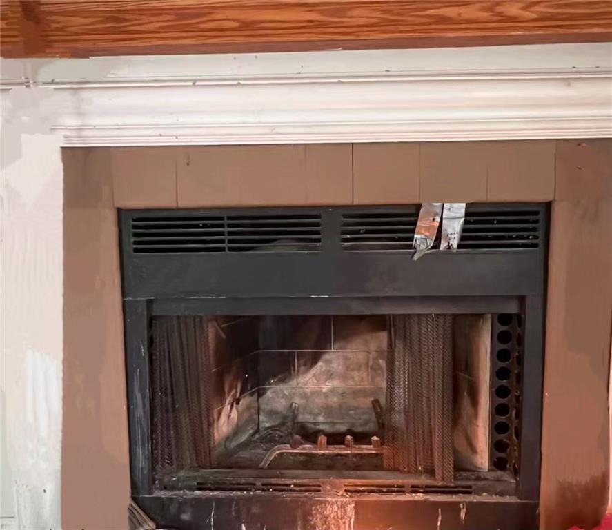 1166 Booth Road Southwest, Unit 908 Marietta, GA 30008 - Photo 28 of 32 a closeup of a fireplace