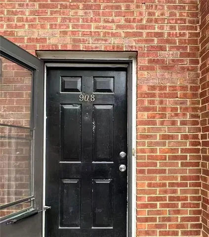 a bathroom with a granite countertop shower
