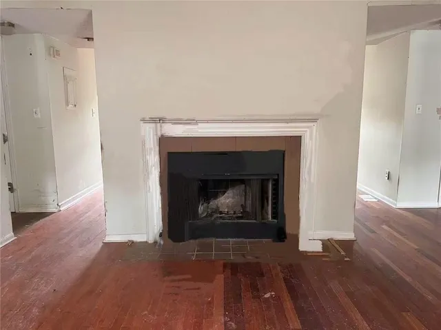 a living room with a fireplace