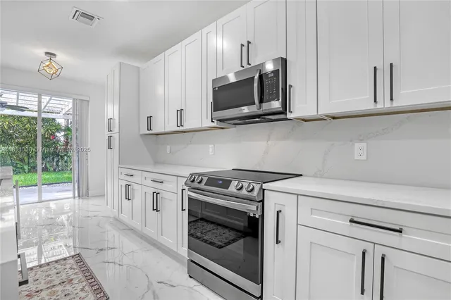 a view of an entryway with a window