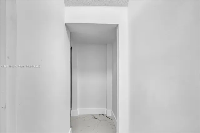 a view of a room that has a window in it