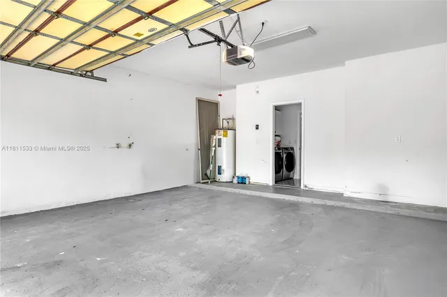 a view of a house with swimming pool and porch with furniture
