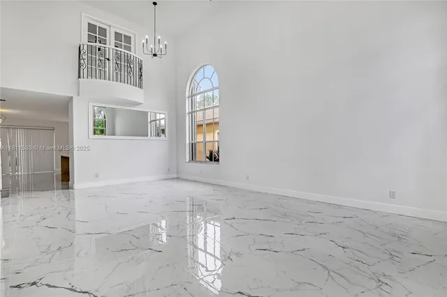 a view of a back yard from a room