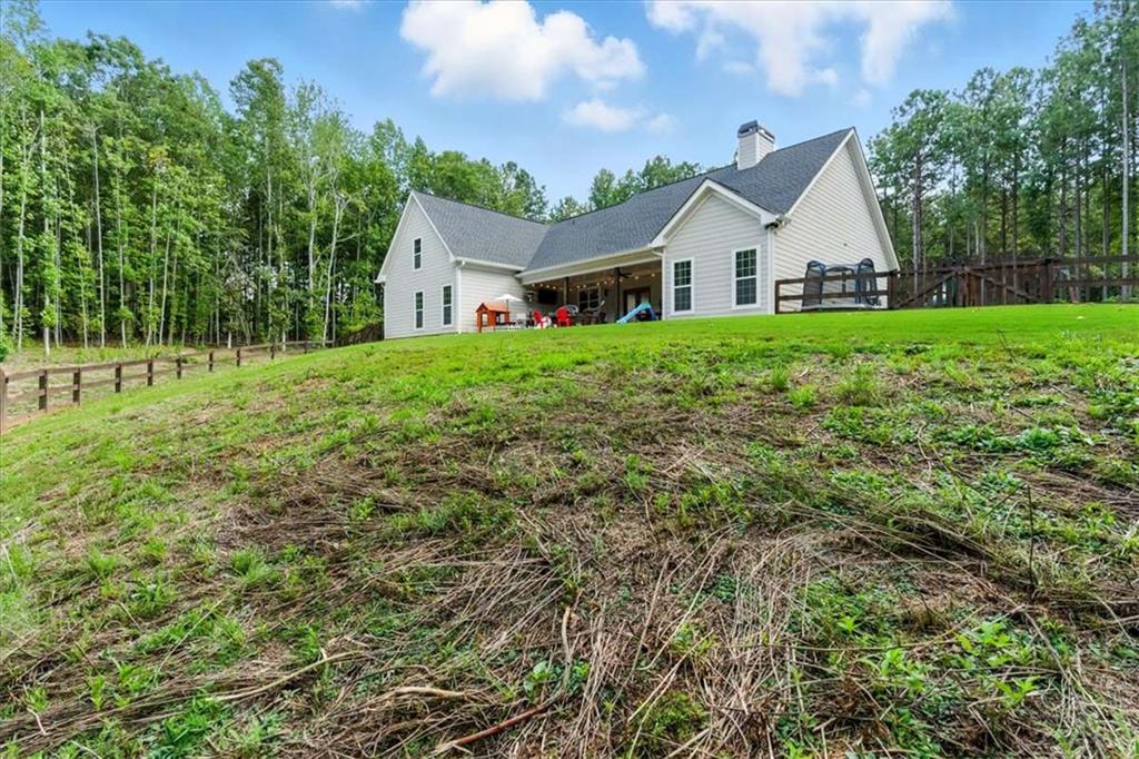 62 Joe Rowell Road Buchanan, GA 30113 - Photo 55 of 63 a view of a house and garden