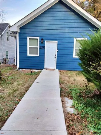 a view of a backyard of a house