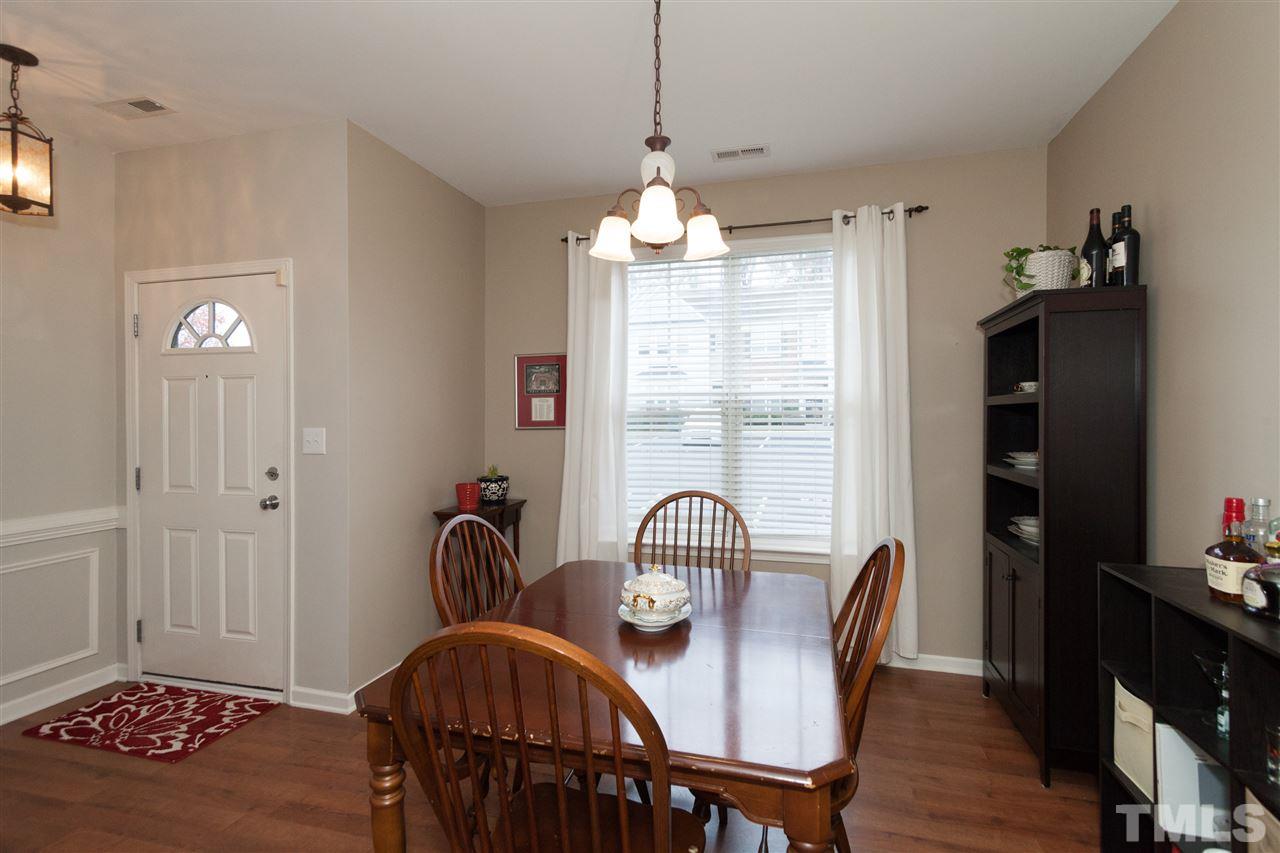 8456 Central Drive Raleigh, NC 27613 - Photo 7 of 25 a dining room with furniture and window
