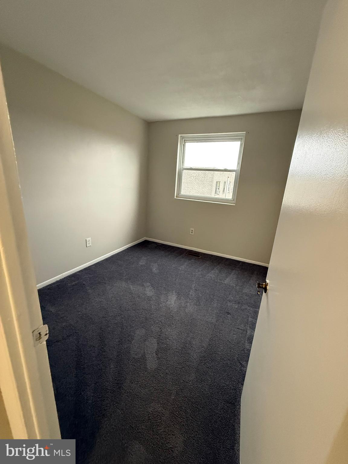 3362 Fairdale Road, Unit 2 Philadelphia, PA 19154 - Photo 12 of 14 an empty room with windows