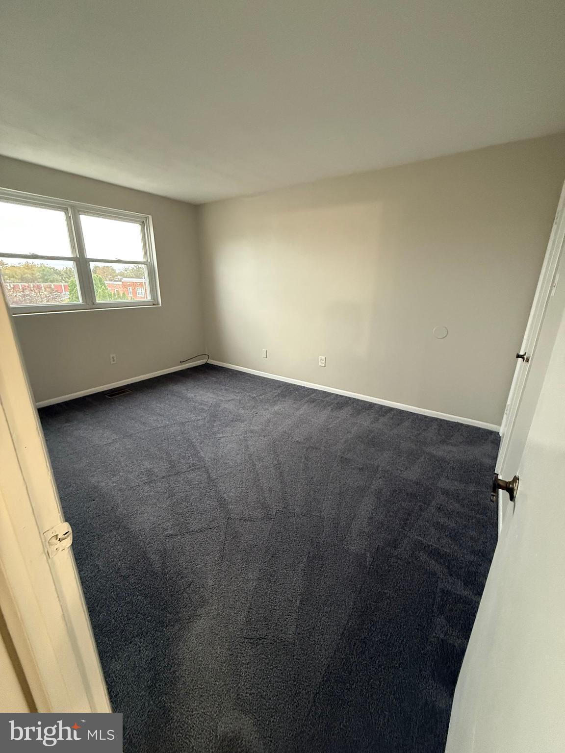 3362 Fairdale Road, Unit 2 Philadelphia, PA 19154 - Photo 10 of 14 an empty room with windows