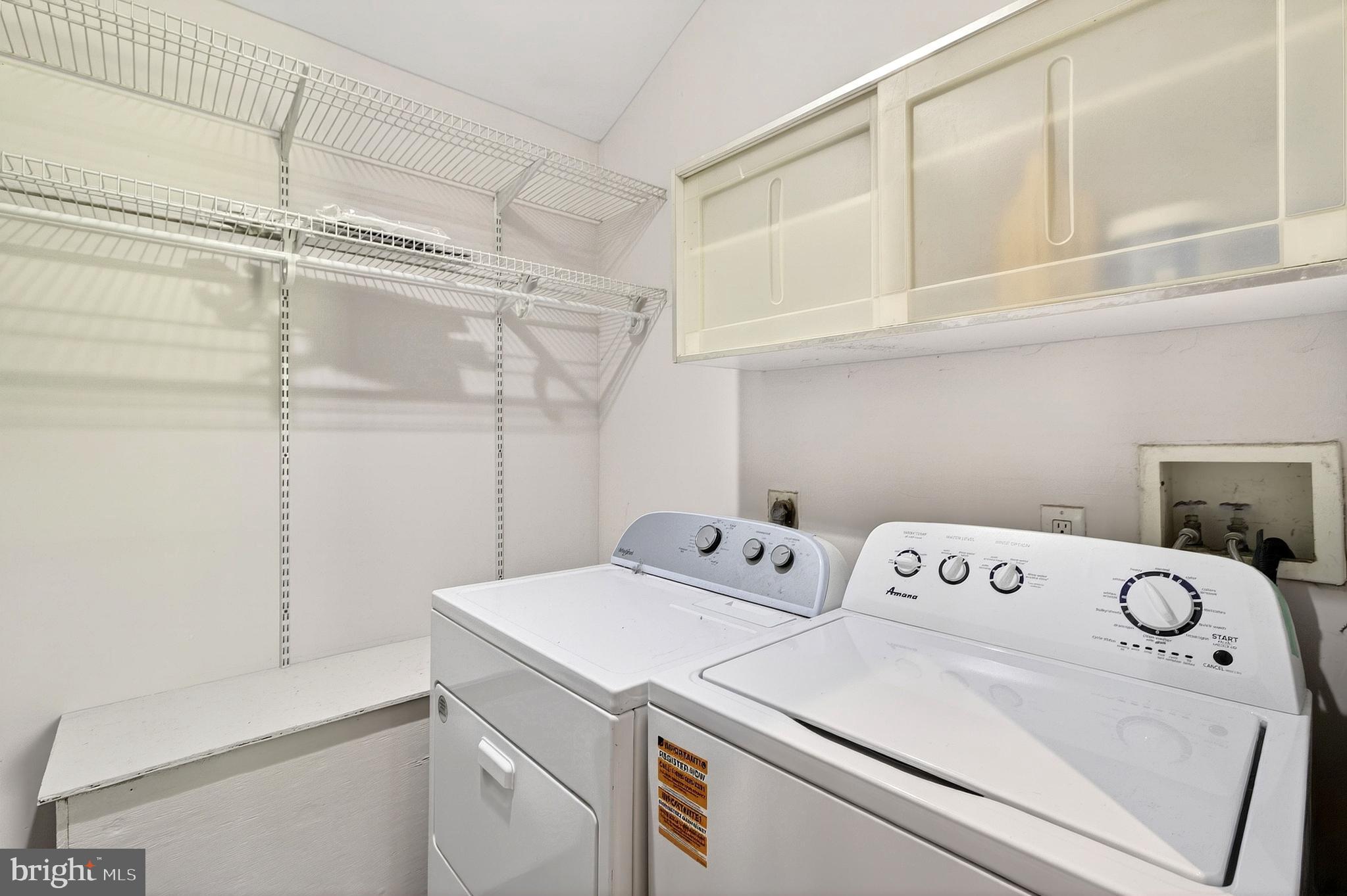 498 Perrineville Road Robbinsville, NJ 08691 - Photo 41 of 59 a utility room with dryer and washer