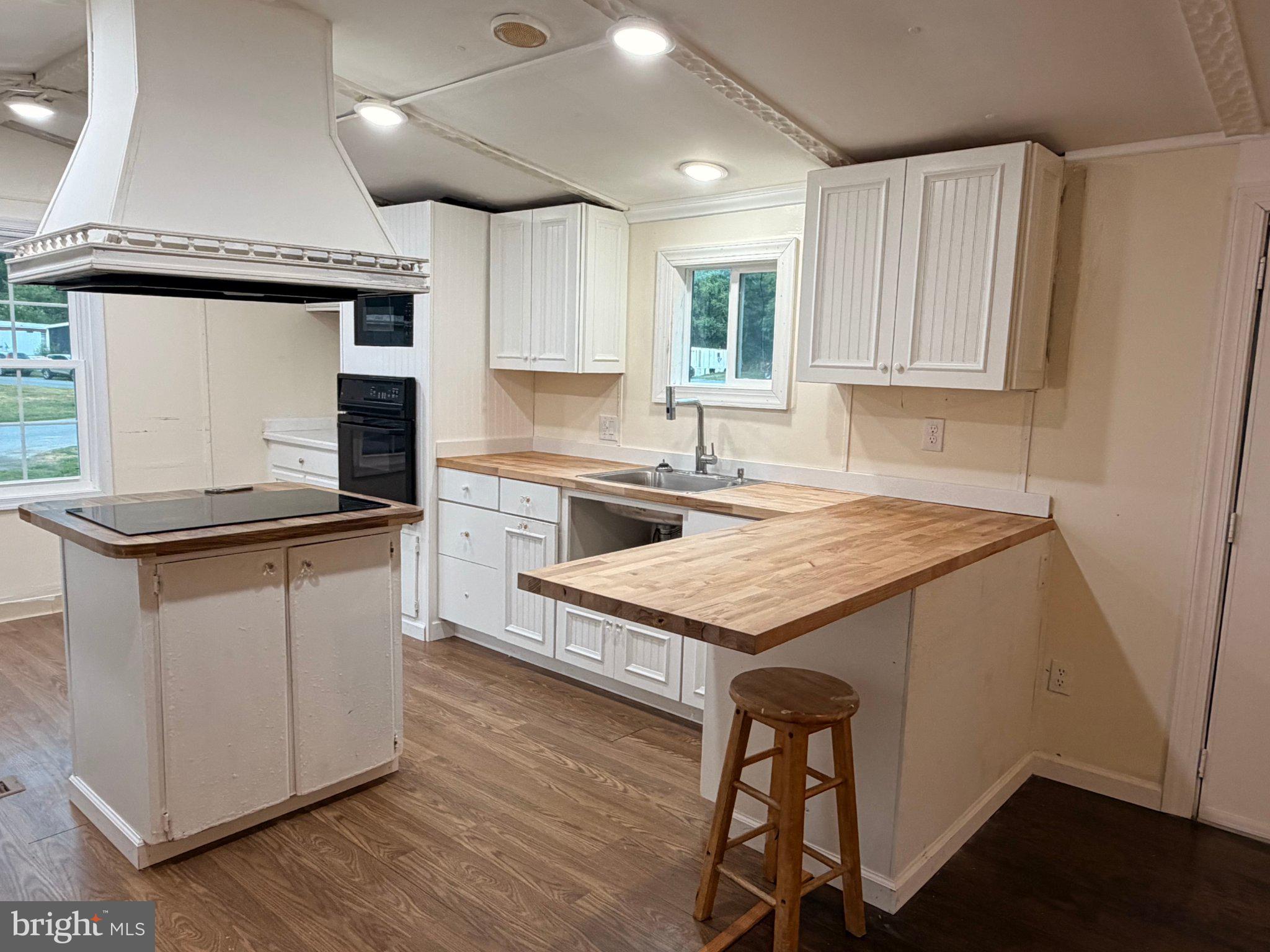 24 Carpenter Street, Unit 24 Dover, DE 19901 - Photo 18 of 27 Bright and airy kitchen with charm.