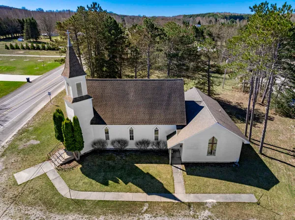 $395,000 | 89 West Church Street, Maple City, MI 49664
