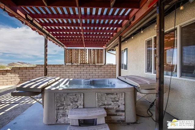 a view of a lake with houses in the back