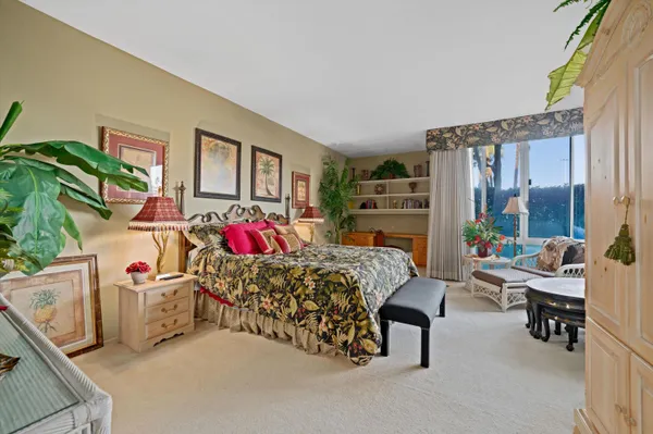 a bedroom with furniture and a couch