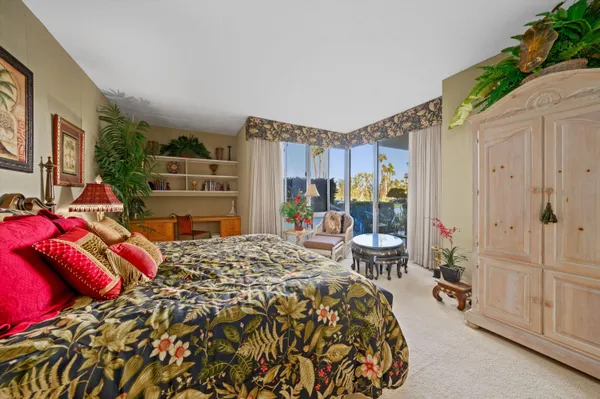 a bed room with a bed and a furniture