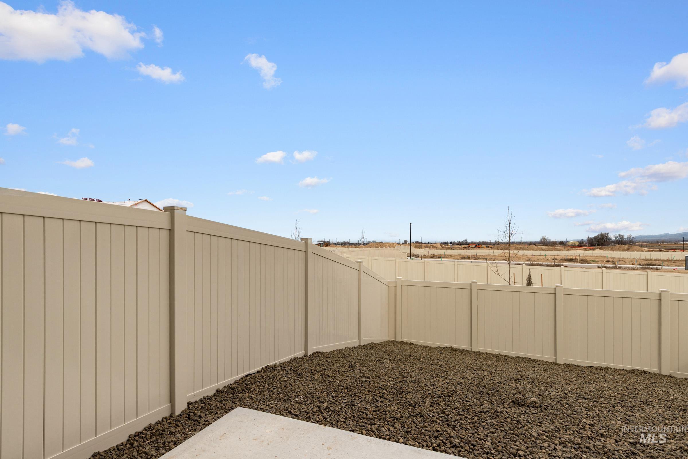 10830 Rutland Street Caldwell, ID 83605 - Photo 19 of 21 Fenced backyard with a patio area
