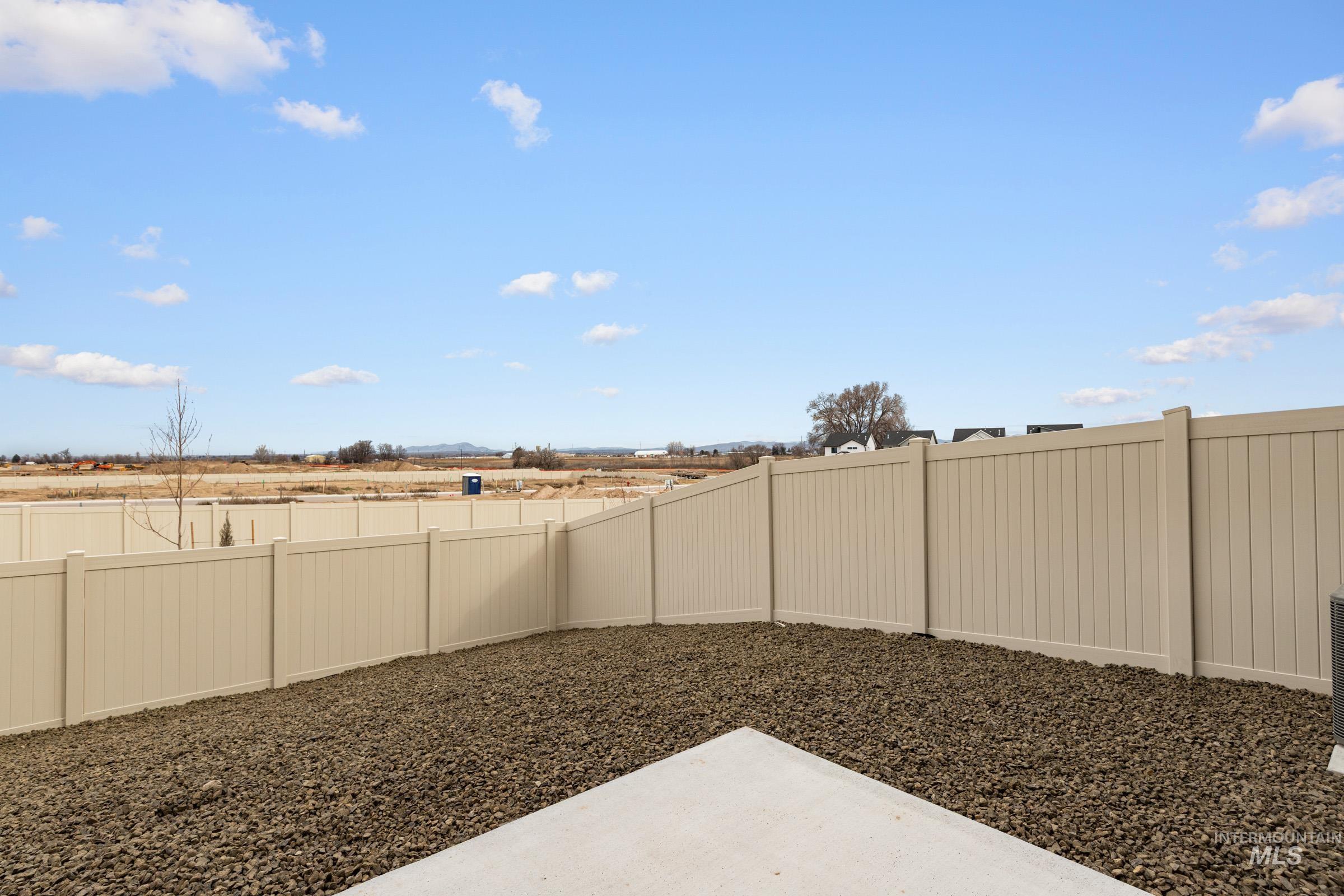 10830 Rutland Street Caldwell, ID 83605 - Photo 20 of 21 Fenced backyard featuring a patio