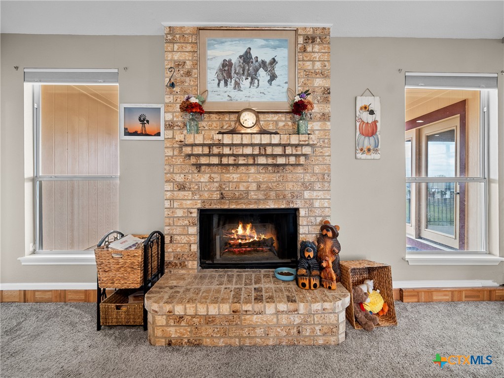 782 Santa Clara Loop Marion, TX 78124 - Photo 43 of 48 a living room with furniture and a fireplace
