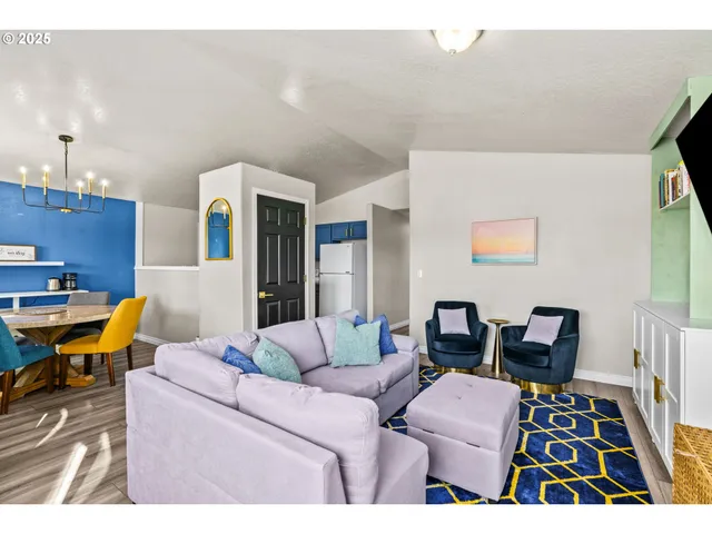 a dining room with furniture and window