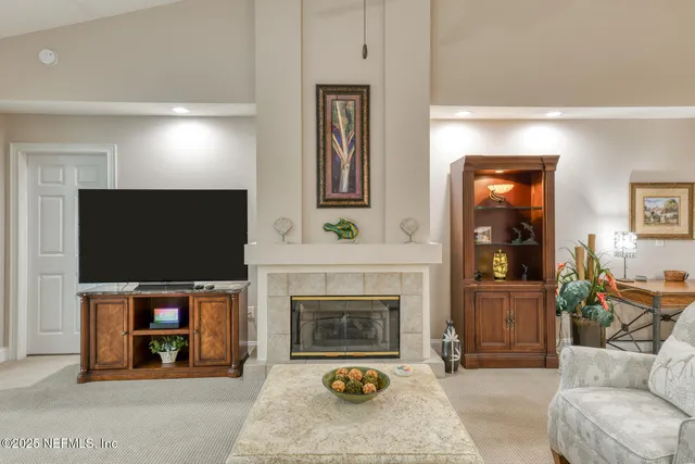 a bathroom with a granite countertop sink mirror vanity and toilet