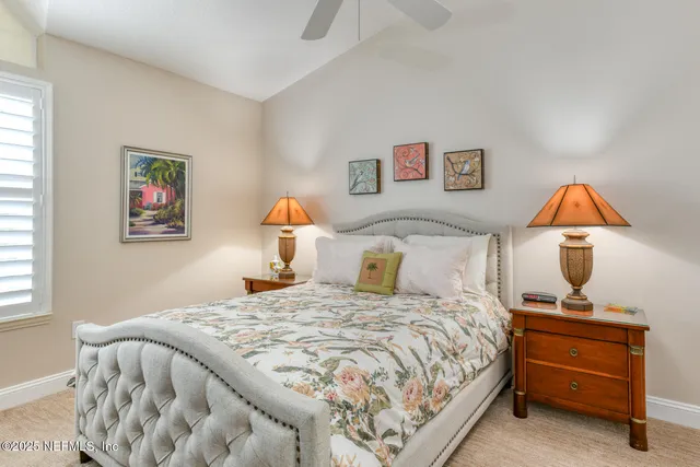 a view of a chair and table in the backyard