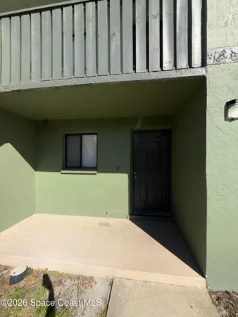 a kitchen with a stove a refrigerator and a sink