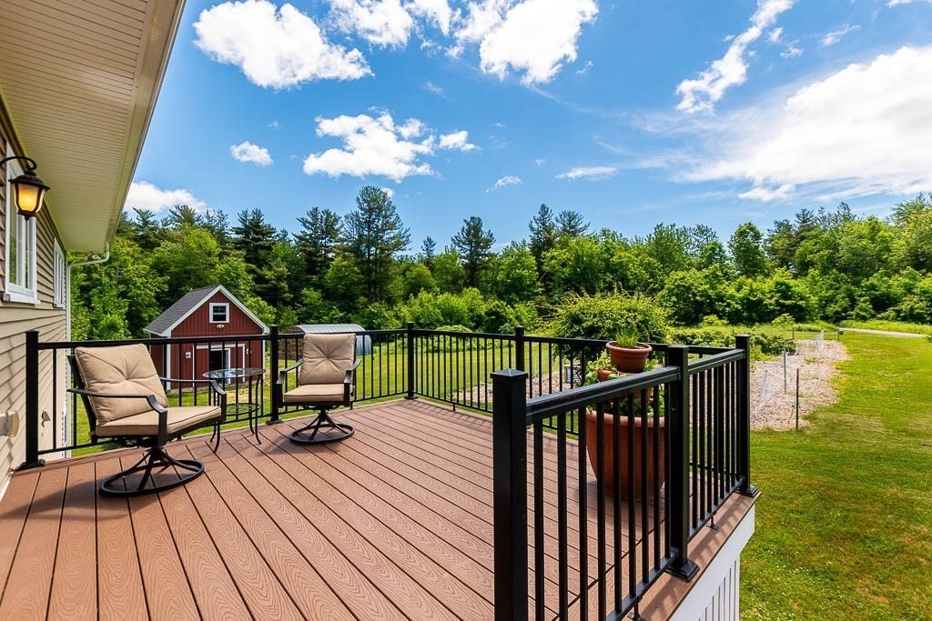 196 Glenwood Road Rutland, MA 01543 - Photo 12 of 37 a view of balcony with wooden floor and outdoor space