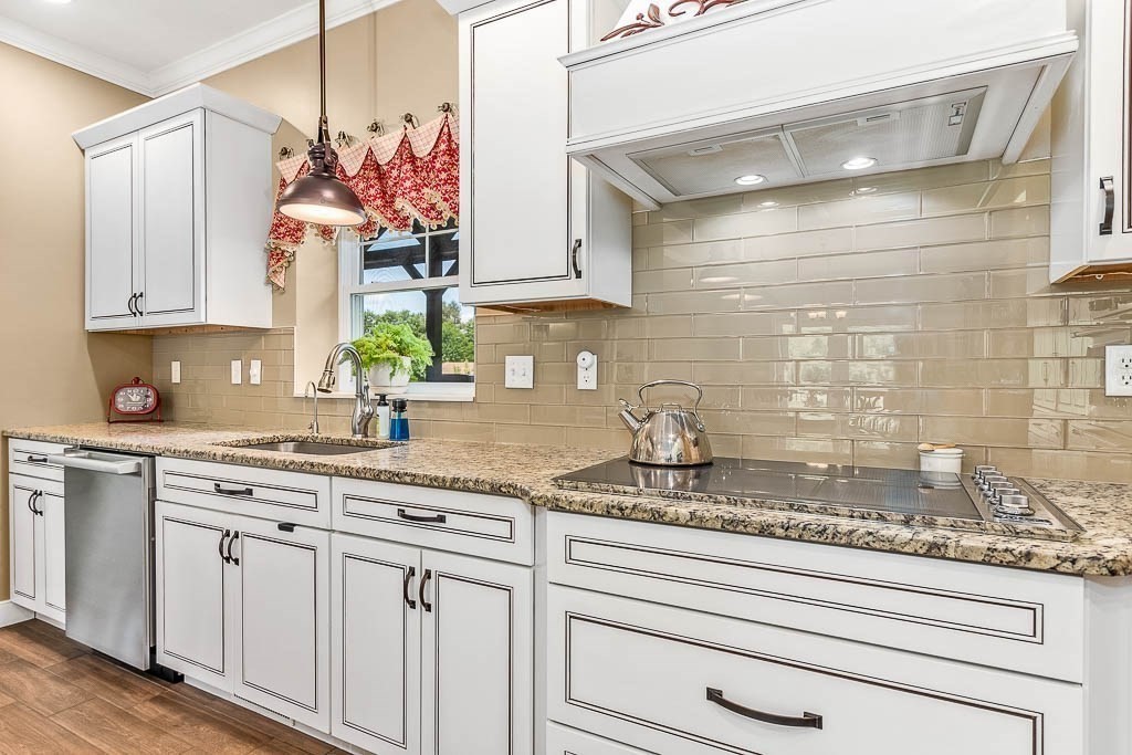 196 Glenwood Road Rutland, MA 01543 - Photo 15 of 37 a kitchen with stainless steel appliances white cabinets and a sink