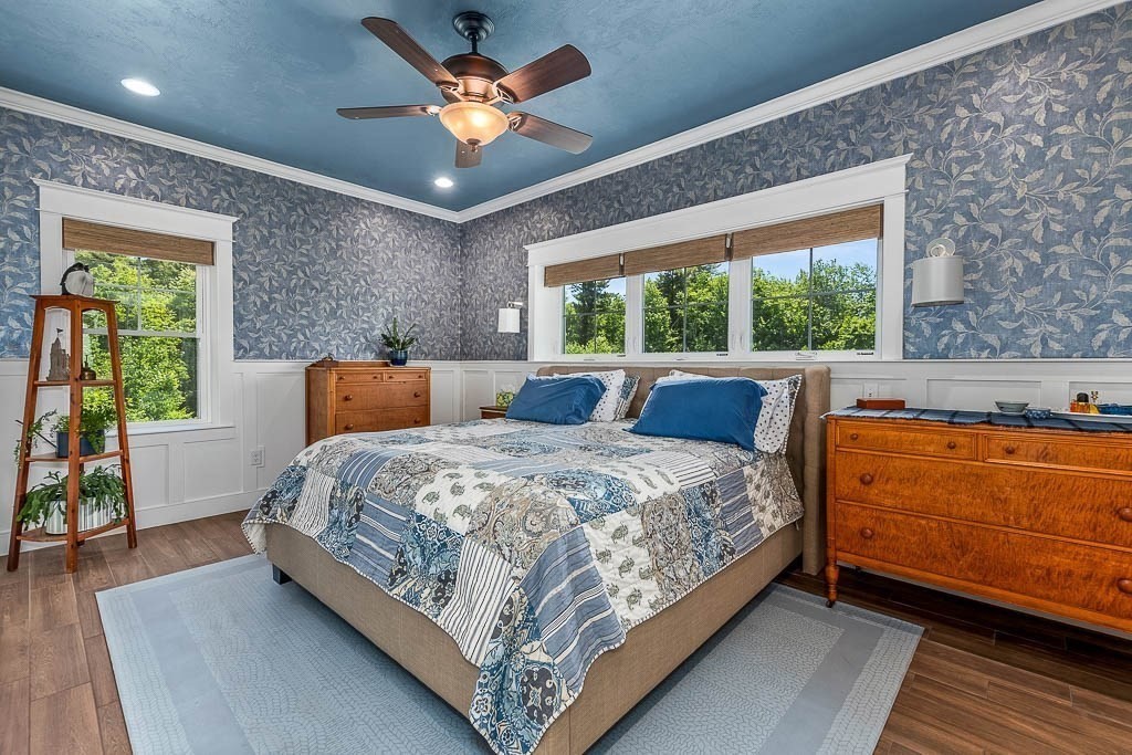 196 Glenwood Road Rutland, MA 01543 - Photo 19 of 37 a bedroom with a bed and a large window