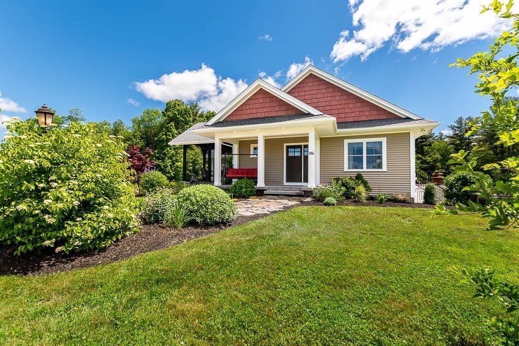 196 Glenwood Road Rutland, MA 01543 - Photo 2 of 37 a view of a house with a yard and potted plants