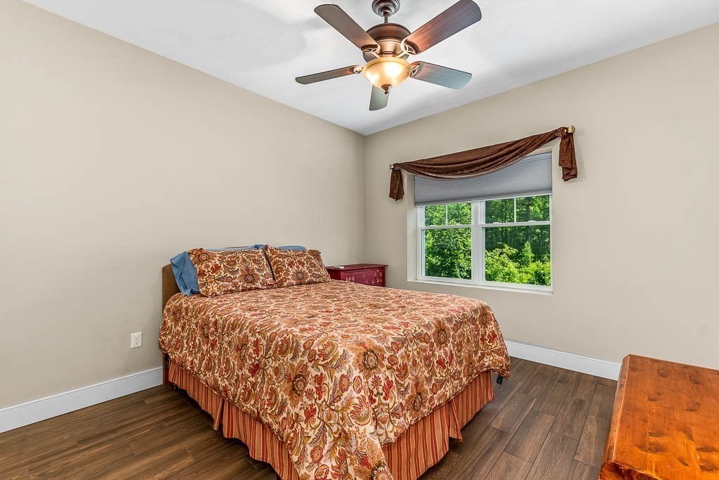 196 Glenwood Road Rutland, MA 01543 - Photo 23 of 37 a bedroom with a bed and a window