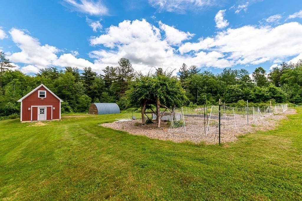 196 Glenwood Road Rutland, MA 01543 - Photo 32 of 37 a swimming pool and trees in the background