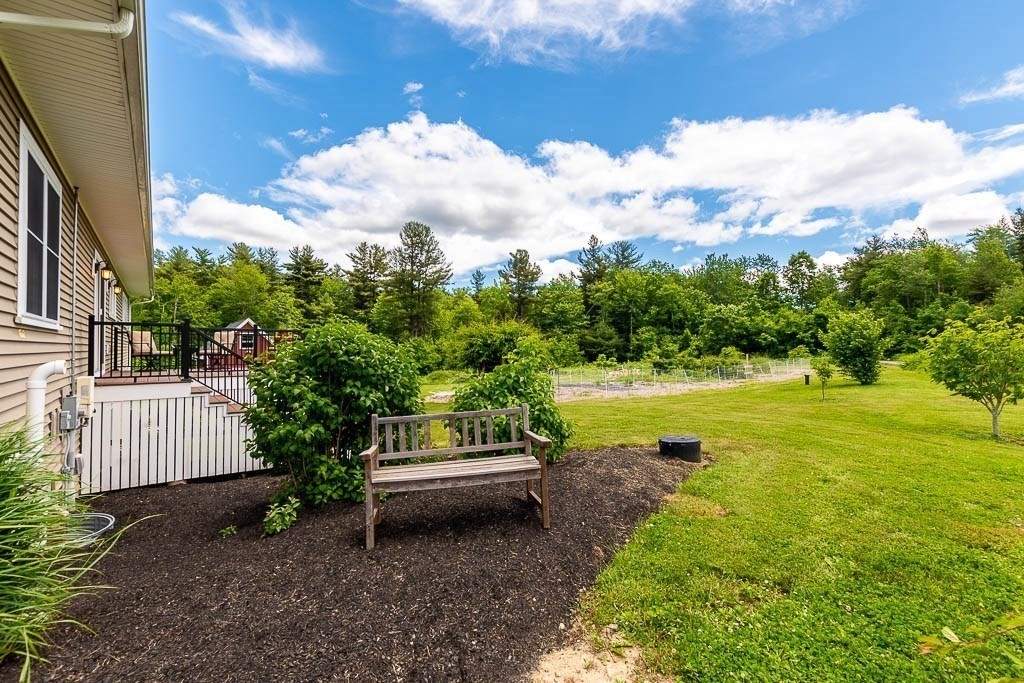 196 Glenwood Road Rutland, MA 01543 - Photo 35 of 37 a view of a swimming pool with a garden