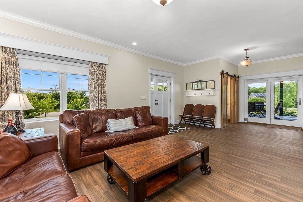196 Glenwood Road Rutland, MA 01543 - Photo 8 of 37 a living room with furniture and a large window