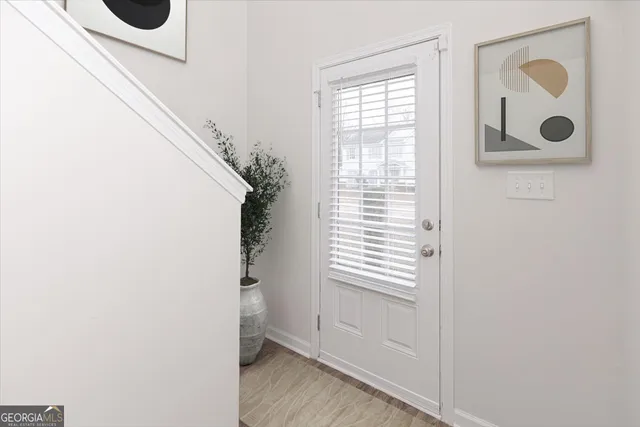 a view of an entryway with a window