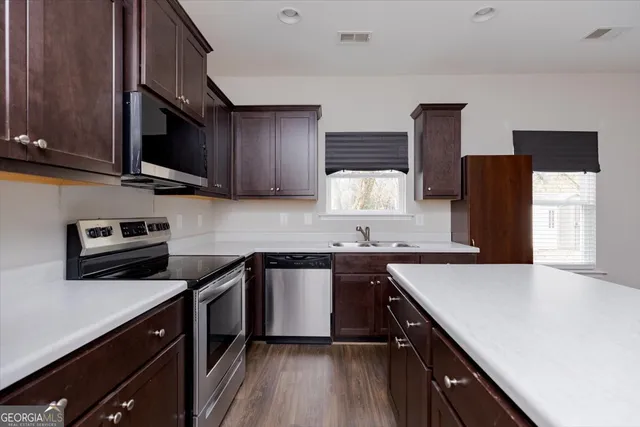 a white bath tub sitting next to a window
