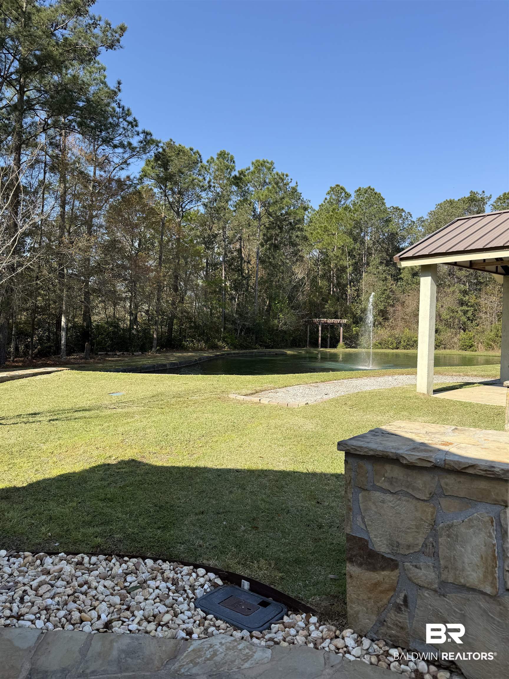 28114 Preserve Trail, Unit 190 Elberta, AL 36530 - Photo 6 of 69 View of green lawn with a water view and a patio area