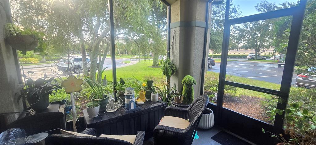 8180 Boat Hook Loop, Unit 108/301 Windermere, FL 34786 - Photo 18 of 27 a outdoor living room with patio