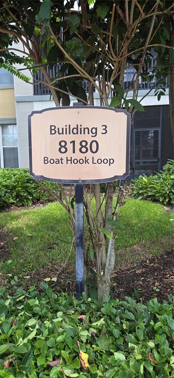 8180 Boat Hook Loop, Unit 108/301 Windermere, FL 34786 - Photo 19 of 27 a view of a sign board