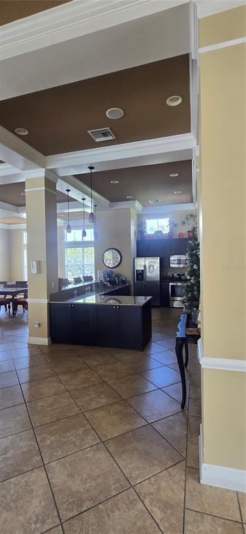 8180 Boat Hook Loop, Unit 108/301 Windermere, FL 34786 - Photo 23 of 27 a lobby with furniture and a potted plant