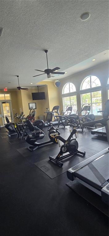 8180 Boat Hook Loop, Unit 108/301 Windermere, FL 34786 - Photo 24 of 27 a view of a room with gym equipment