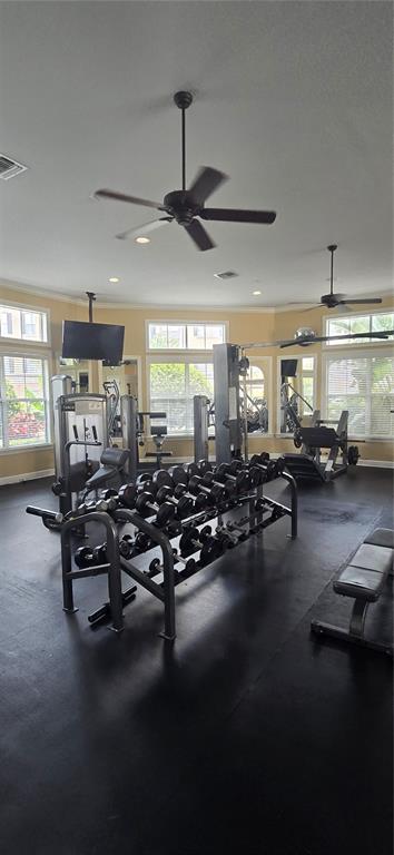 8180 Boat Hook Loop, Unit 108/301 Windermere, FL 34786 - Photo 25 of 27 a gym room with lots of furniture and a chandelier