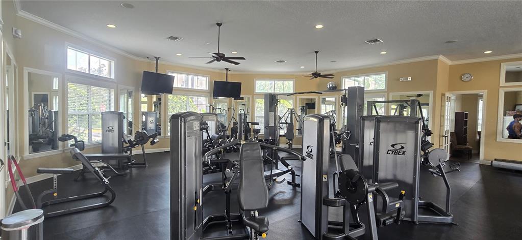 8180 Boat Hook Loop, Unit 108/301 Windermere, FL 34786 - Photo 26 of 27 a view of a room with gym equipment
