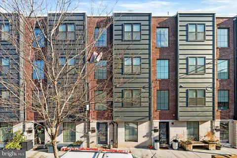 a front view of a building with a street